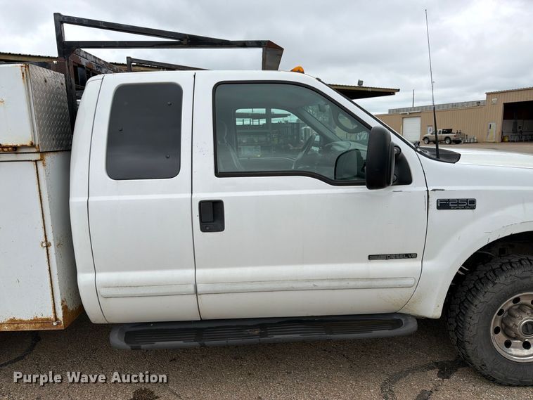 image for item FK3101 2001 Ford F250 Super Duty XL Ext. Cab utility bed pickup truck