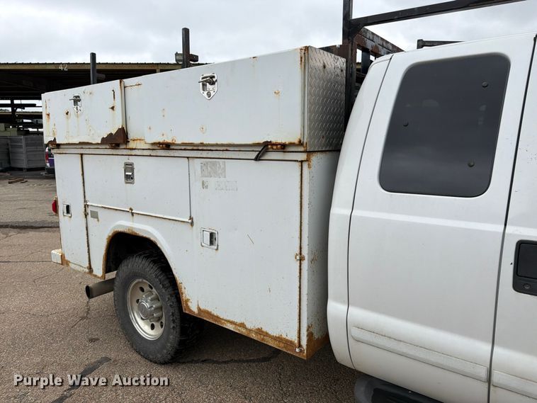 image for item FK3101 2001 Ford F250 Super Duty XL Ext. Cab utility bed pickup truck