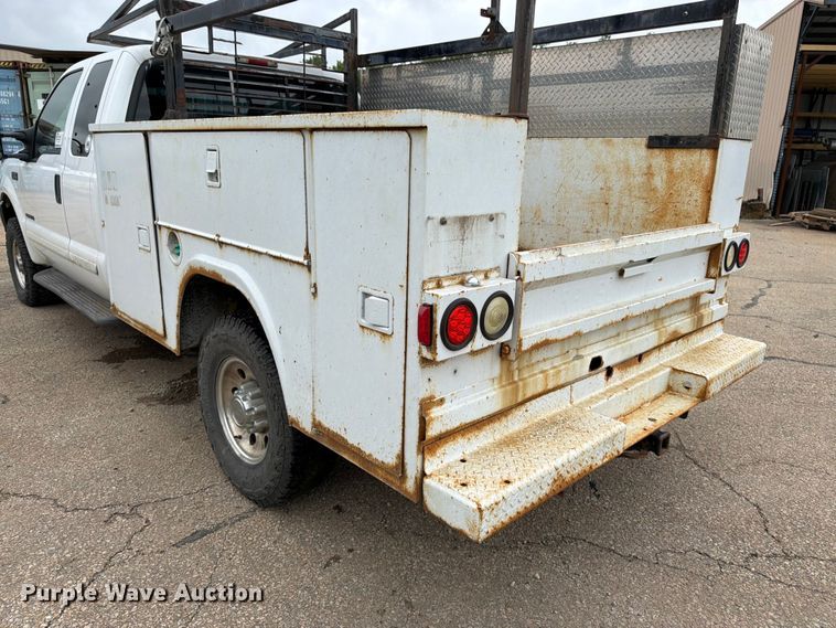 image for item FK3101 2001 Ford F250 Super Duty XL Ext. Cab utility bed pickup truck