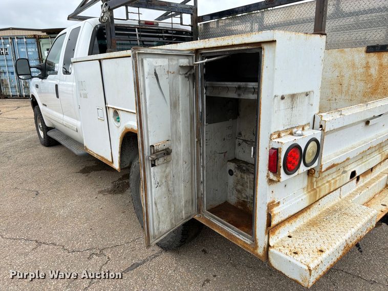 image for item FK3101 2001 Ford F250 Super Duty XL Ext. Cab utility bed pickup truck