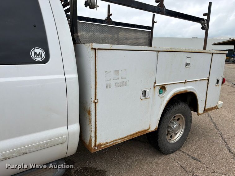 image for item FK3101 2001 Ford F250 Super Duty XL Ext. Cab utility bed pickup truck