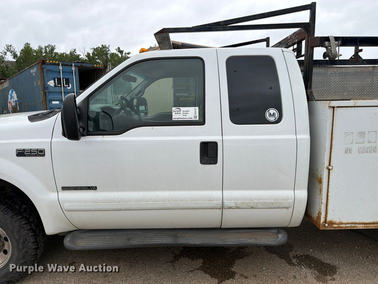 image for item FK3101 2001 Ford F250 Super Duty XL Ext. Cab utility bed pickup truck