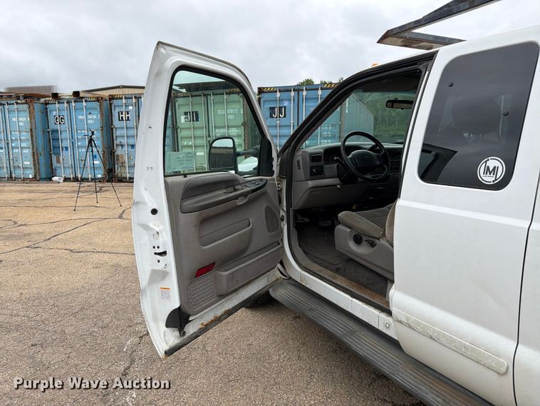 image for item FK3101 2001 Ford F250 Super Duty XL Ext. Cab utility bed pickup truck