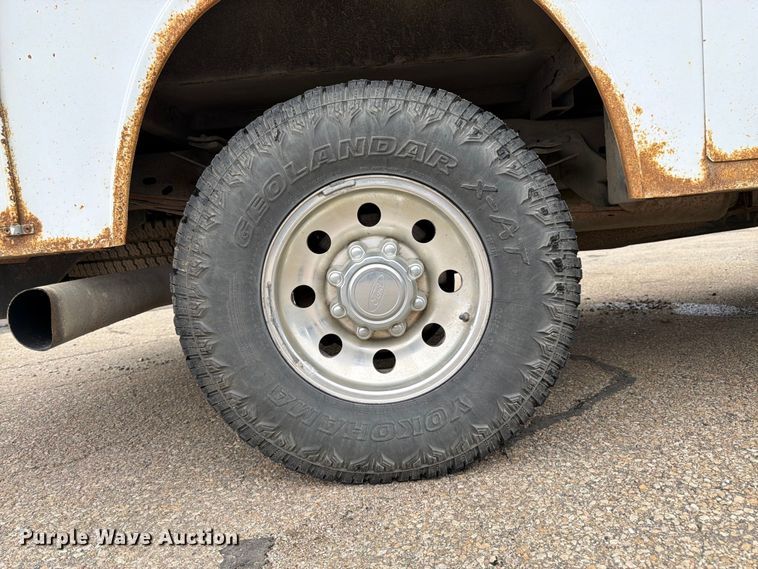 image for item FK3101 2001 Ford F250 Super Duty XL Ext. Cab utility bed pickup truck