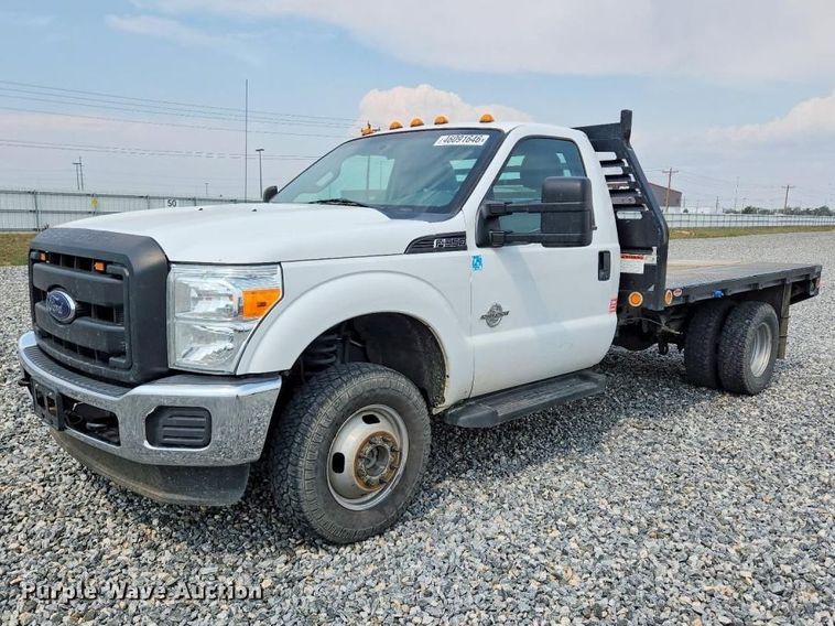 image for item YA2836 2015 Ford F350 Super Duty flatbed pickup truck