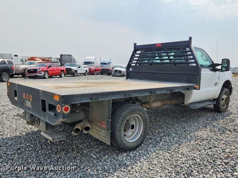 image for item YA2836 2015 Ford F350 Super Duty flatbed pickup truck