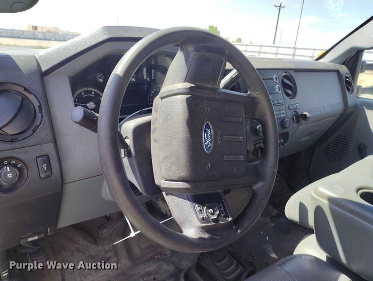 image for item YA2836 2015 Ford F350 Super Duty flatbed pickup truck