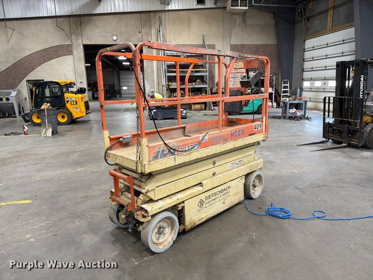 image for item DQ0032 1999 JLG 2032E2 scissor lift