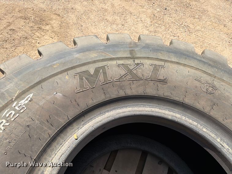 image for item DQ0057 Titan MXL 23.5R25 tire