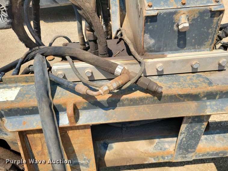 image for item EE1144 2011 Bobcat WS18 skid steer rock saw