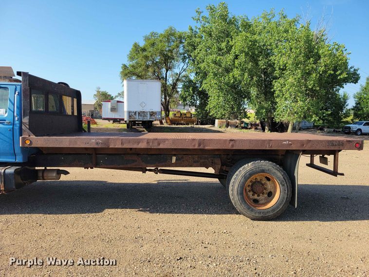 image for item EE1145 1995 Ford F700 dump flatbed truck