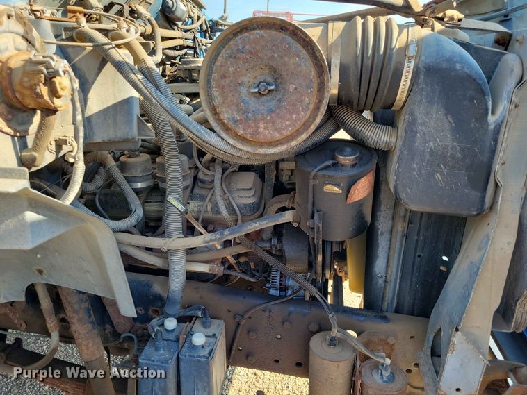 image for item EE1145 1995 Ford F700 dump flatbed truck