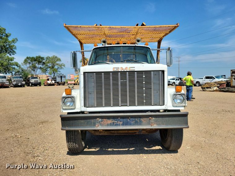 image for item EE1150 1986 GMC Bombardier truck cab and chassis with tree spade