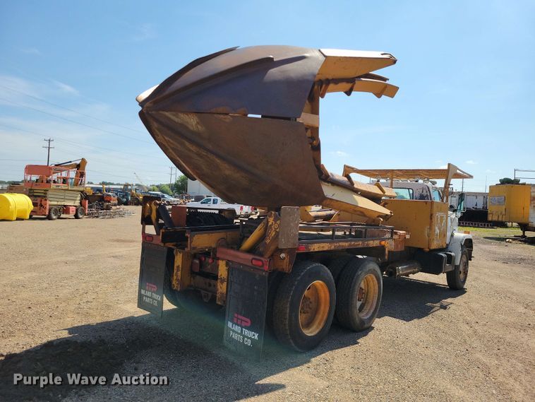 image for item EE1150 1986 GMC Bombardier truck cab and chassis with tree spade