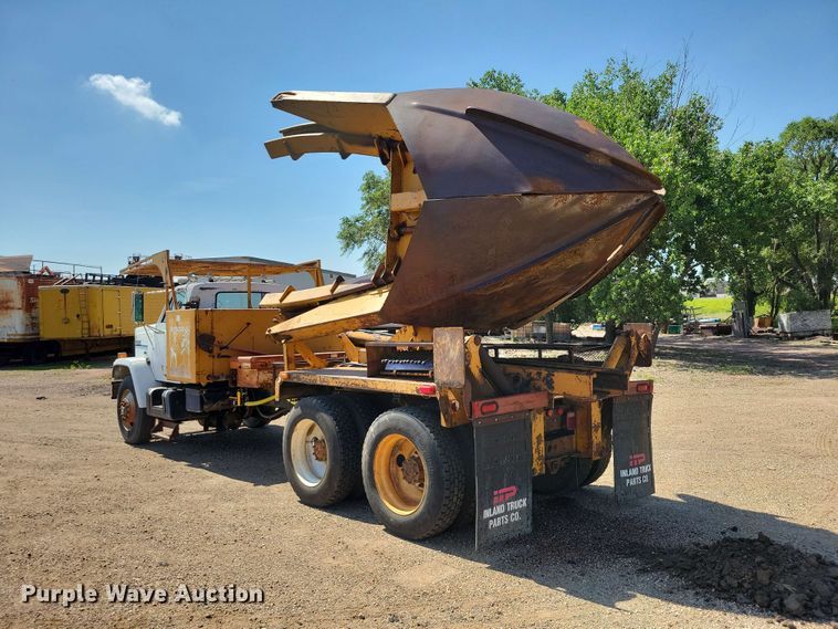 image for item EE1150 1986 GMC Bombardier truck cab and chassis with tree spade