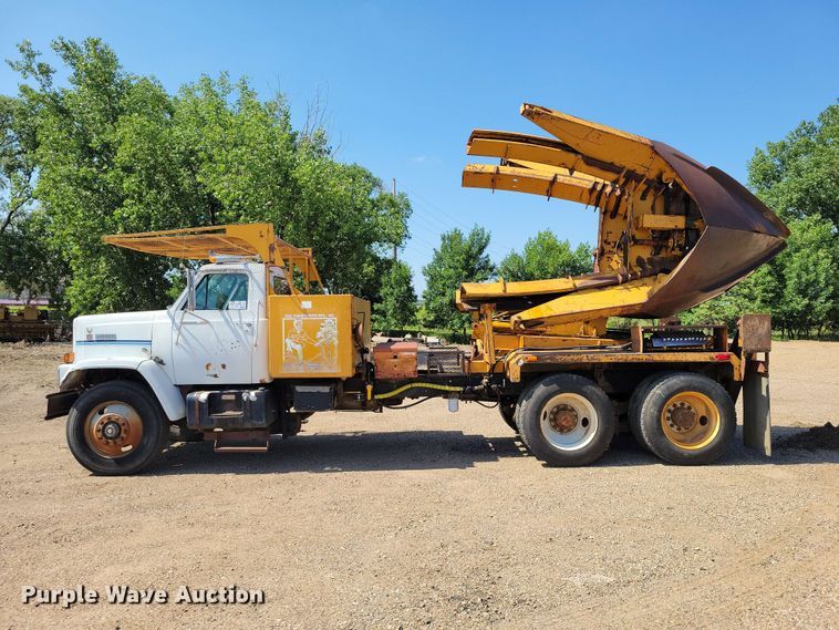 image for item EE1150 1986 GMC Bombardier truck cab and chassis with tree spade