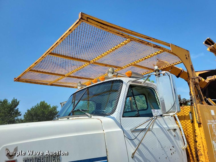 image for item EE1150 1986 GMC Bombardier truck cab and chassis with tree spade
