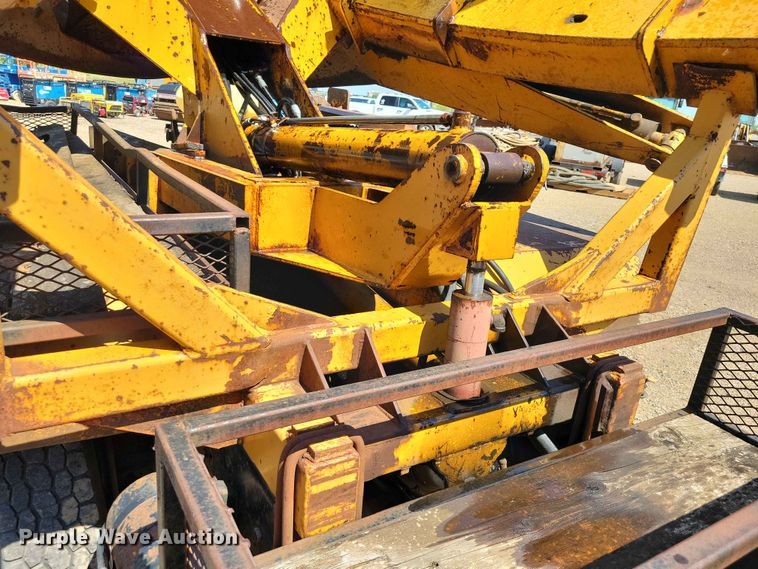 image for item EE1150 1986 GMC Bombardier truck cab and chassis with tree spade