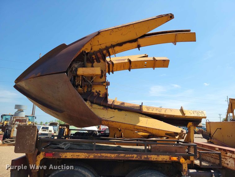 image for item EE1150 1986 GMC Bombardier truck cab and chassis with tree spade