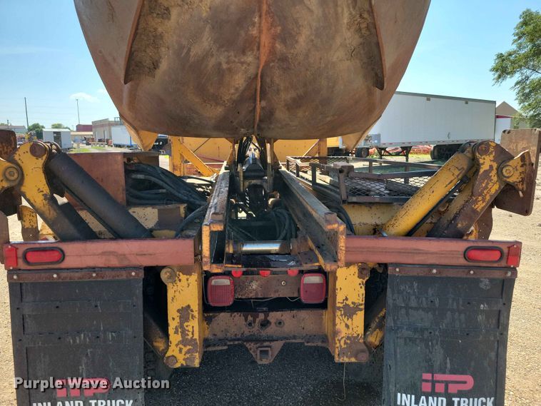 image for item EE1150 1986 GMC Bombardier truck cab and chassis with tree spade