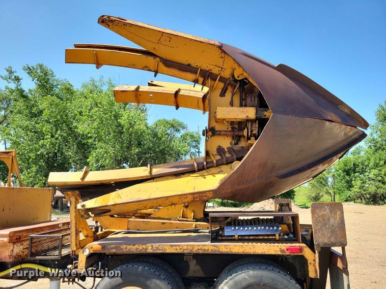 image for item EE1150 1986 GMC Bombardier truck cab and chassis with tree spade
