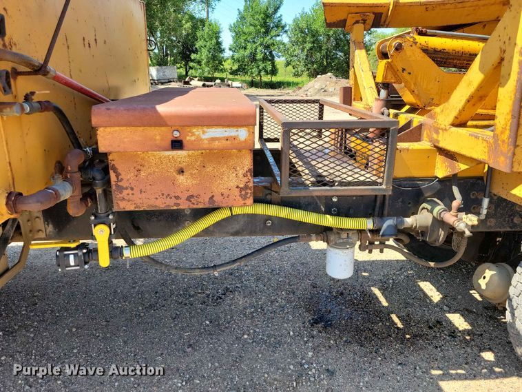 image for item EE1150 1986 GMC Bombardier truck cab and chassis with tree spade