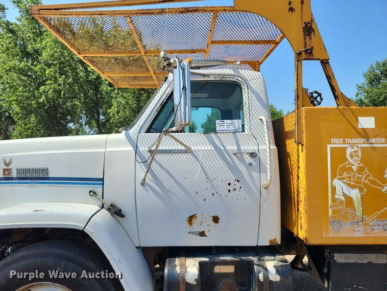 image for item EE1150 1986 GMC Bombardier truck cab and chassis with tree spade