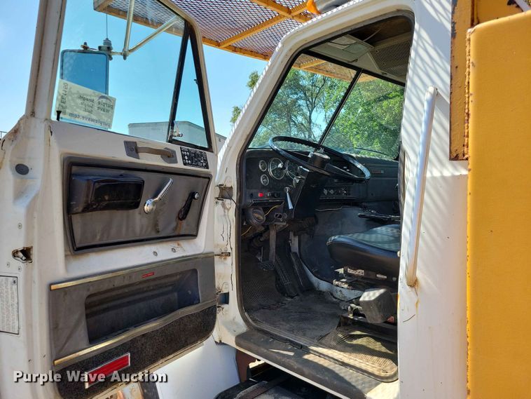 image for item EE1150 1986 GMC Bombardier truck cab and chassis with tree spade
