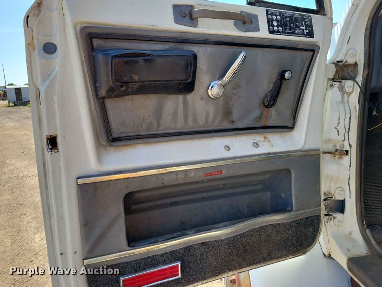 image for item EE1150 1986 GMC Bombardier truck cab and chassis with tree spade