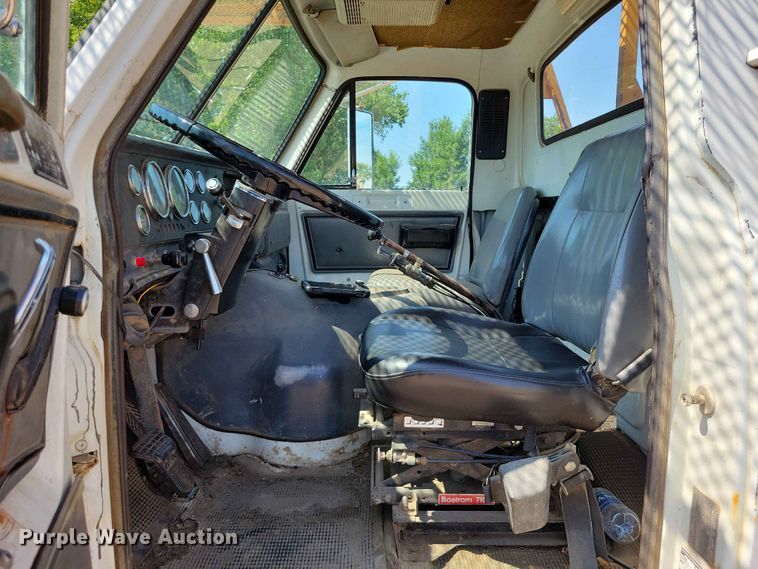 image for item EE1150 1986 GMC Bombardier truck cab and chassis with tree spade