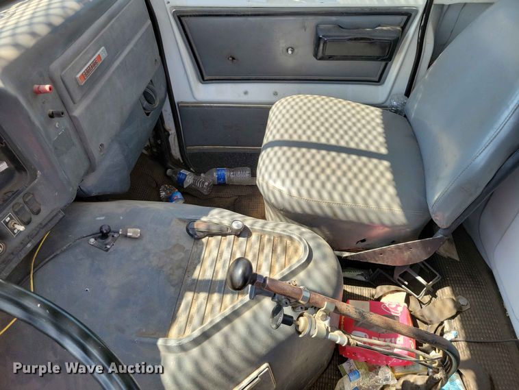 image for item EE1150 1986 GMC Bombardier truck cab and chassis with tree spade