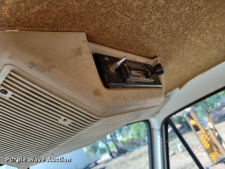 image for item EE1150 1986 GMC Bombardier truck cab and chassis with tree spade