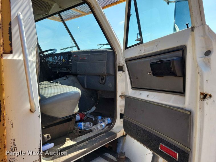 image for item EE1150 1986 GMC Bombardier truck cab and chassis with tree spade