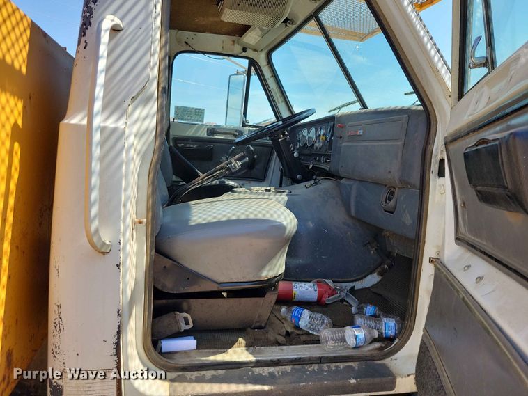image for item EE1150 1986 GMC Bombardier truck cab and chassis with tree spade