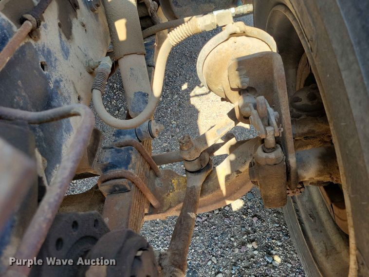 image for item EE1150 1986 GMC Bombardier truck cab and chassis with tree spade