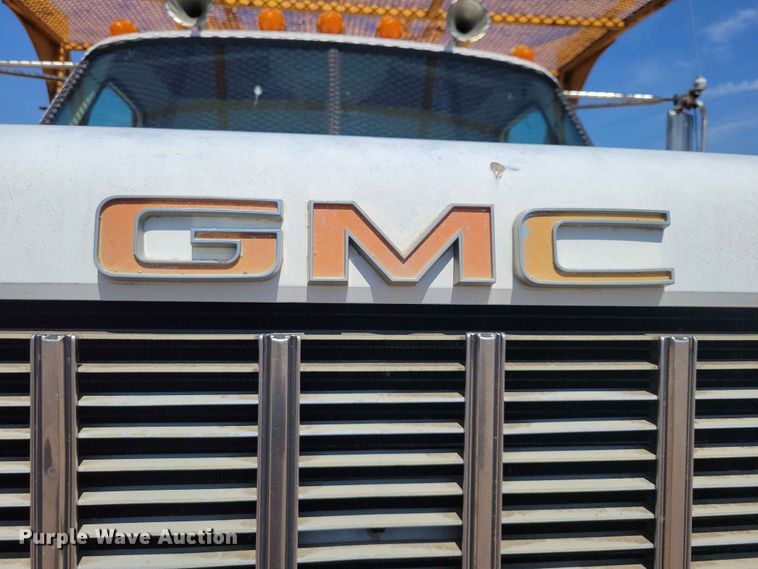 image for item EE1150 1986 GMC Bombardier truck cab and chassis with tree spade