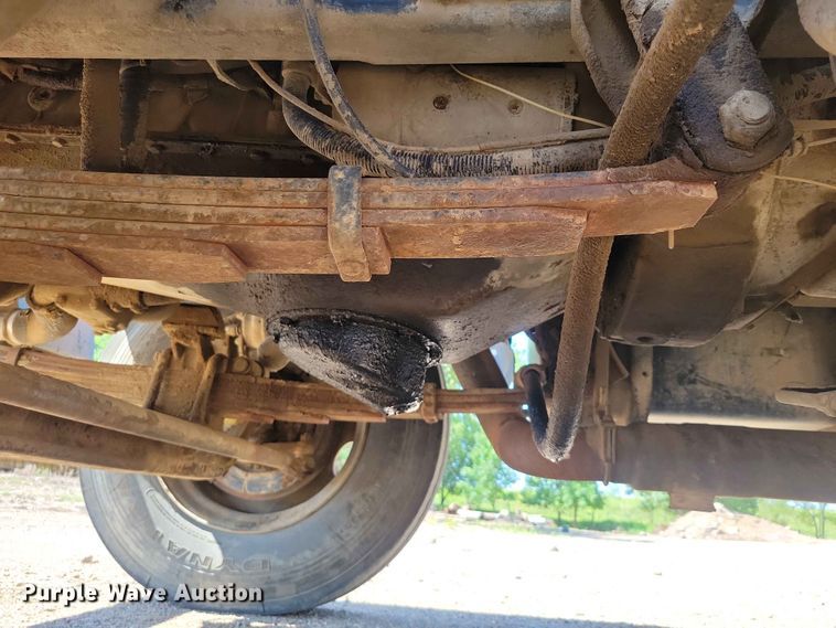image for item EE1150 1986 GMC Bombardier truck cab and chassis with tree spade