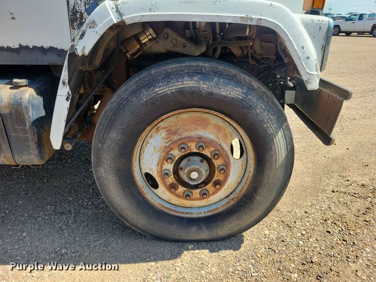 image for item EE1150 1986 GMC Bombardier truck cab and chassis with tree spade