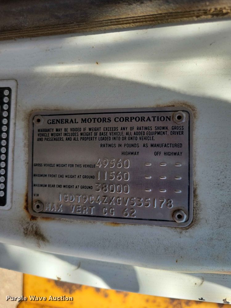 image for item EE1150 1986 GMC Bombardier truck cab and chassis with tree spade