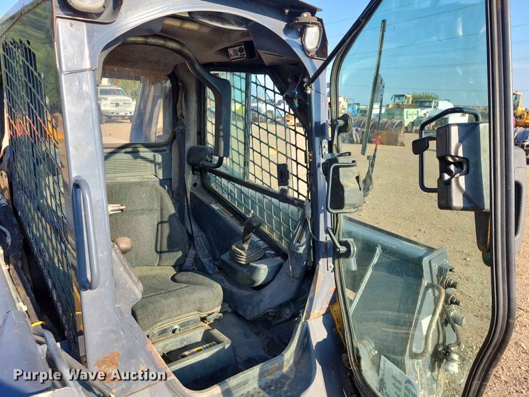 image for item EE1165 2015 John Deere 323E tracked skid steer loader