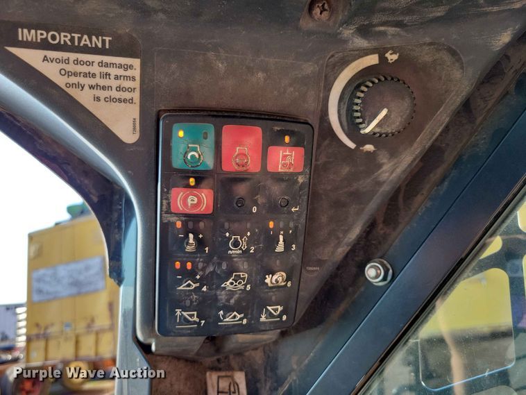 image for item EE1165 2015 John Deere 323E tracked skid steer loader