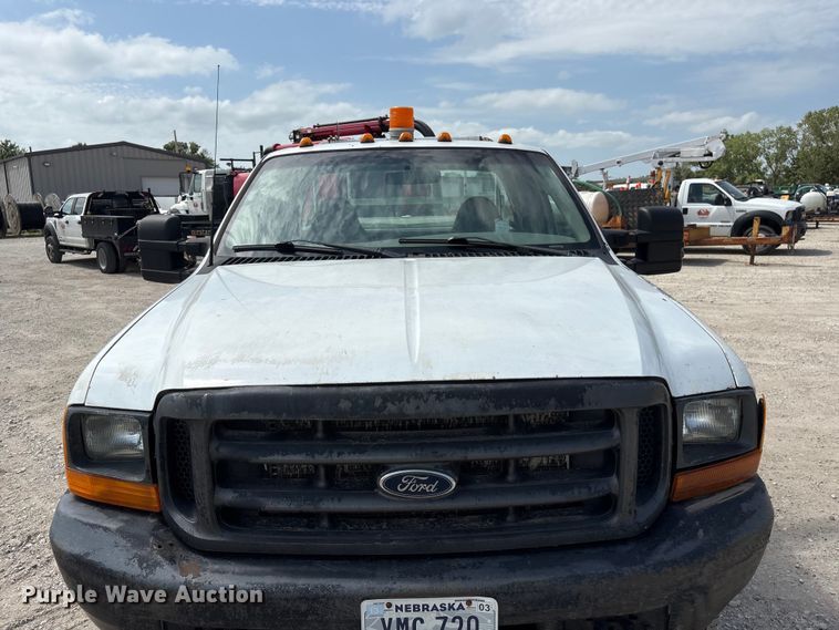 image for item EI5946 2001 Ford F350 Super Duty Ext. Cab utility bed pickup truck