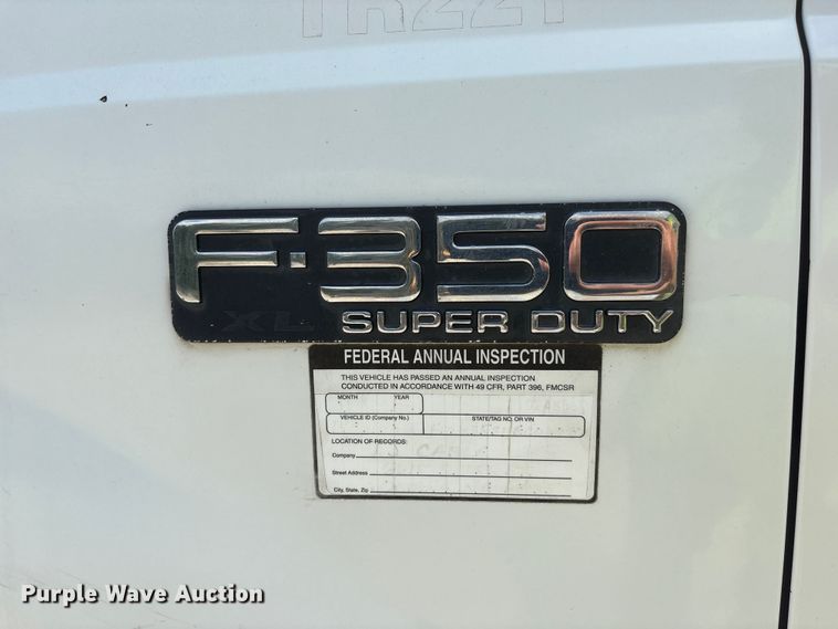 image for item EI5946 2001 Ford F350 Super Duty Ext. Cab utility bed pickup truck
