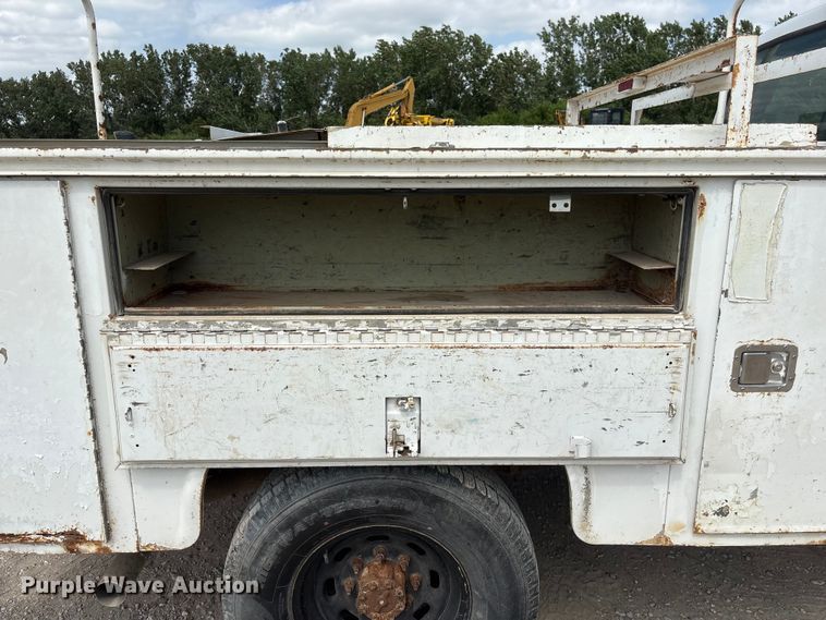 image for item EI5946 2001 Ford F350 Super Duty Ext. Cab utility bed pickup truck