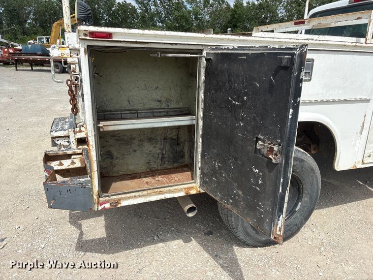 image for item EI5946 2001 Ford F350 Super Duty Ext. Cab utility bed pickup truck