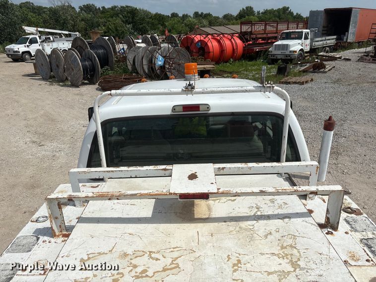 image for item EI5946 2001 Ford F350 Super Duty Ext. Cab utility bed pickup truck