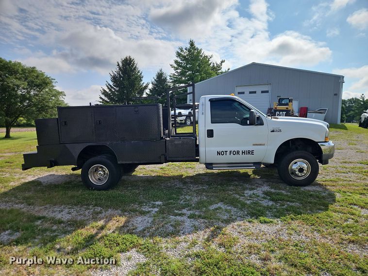 image for item EO8536 2003 Ford F350 Super Duty XL flatbed pickup truck