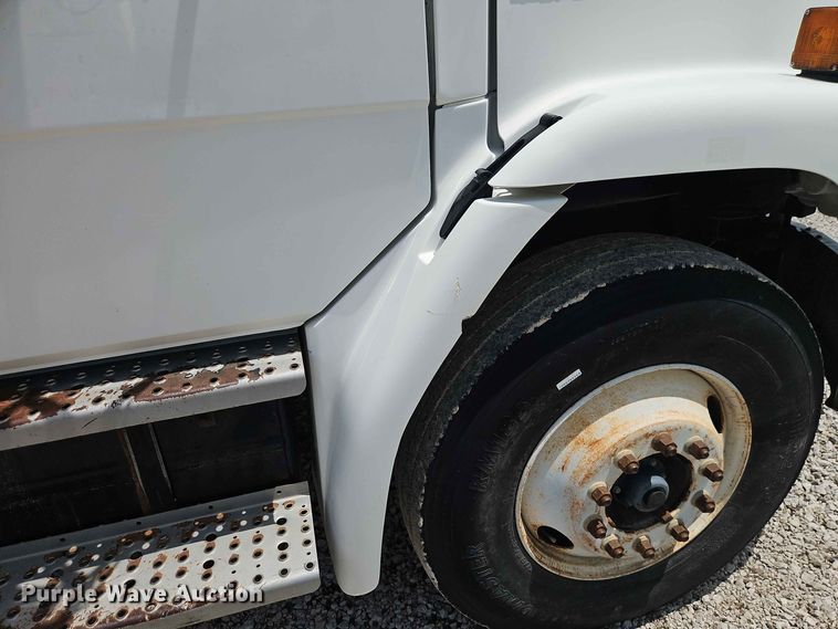 image for item EO8589 2002 Freightliner FL70 flatbed truck