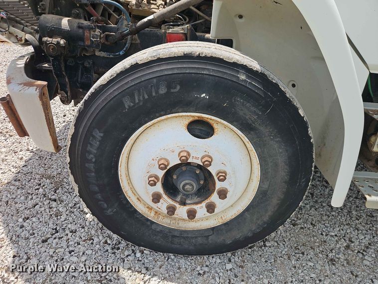 image for item EO8589 2002 Freightliner FL70 flatbed truck