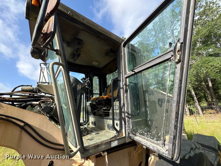 image for item EU0682 1999 Champion 720A motor grader